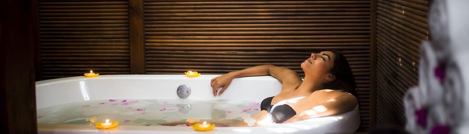 Woman soaking in Spa in Riviera Nayarit Mexico