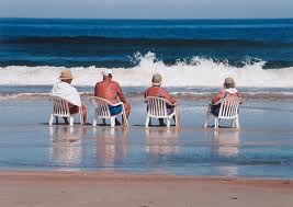 Retirees3 Four people in lawn chairs in the water in Riviera Nayarit MX