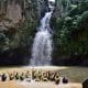 Rappelling in Riviera Nayarit Mexico - image of rappelling group in pool below waterfalls