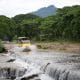 Outdoor Adventures in Riviera Nayarit Mexico - image of all terrain vehicle crossing a stream