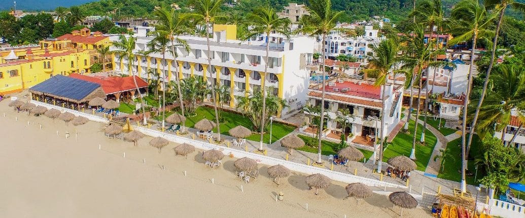 Aerial view of beach and Costa Alegre hotel in Rincon de Guayabitos Riviera Nayarit Mexico