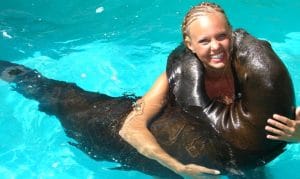 Sealion2 Sea lion encounters in Riviera Nayarit Mexico - image of young girl hugging a sea lion