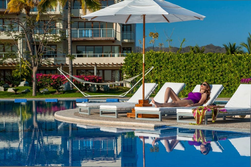 Sun tanning by the pool at B Nayar Hotel in La Cruz de Huanacaxtle Riviera Nayarit MX